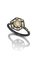 6mm pavé Diamond is set into 14k gold bezel, framed in hexagon shape that sits on top of oxidized sterling silver band. Photo Credit: Cole Rodger Photography.
