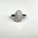 Oval Pavé Diamond set into fine silver bezel, soldered onto heavy hammered triangle wire, that's been oxidized sterling silver. Photo Credit: Cole Rodger Photography
