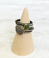 A set of 5 rings, one with 10mm pavé diamond disc set into 14k gold bezel with 14k beaded oxidized sterling silver band, one 6mm rose cut serpentine set into 14k gold bezel with hammered oxidized sterling silver beaded band, one skinny triangle oxidized and highlighted sterling silver band separating the two stone rings, sandwiching both ends are two heavy hammered oxidized sterling silver bands, for a decorative classic look to complete your outfit.