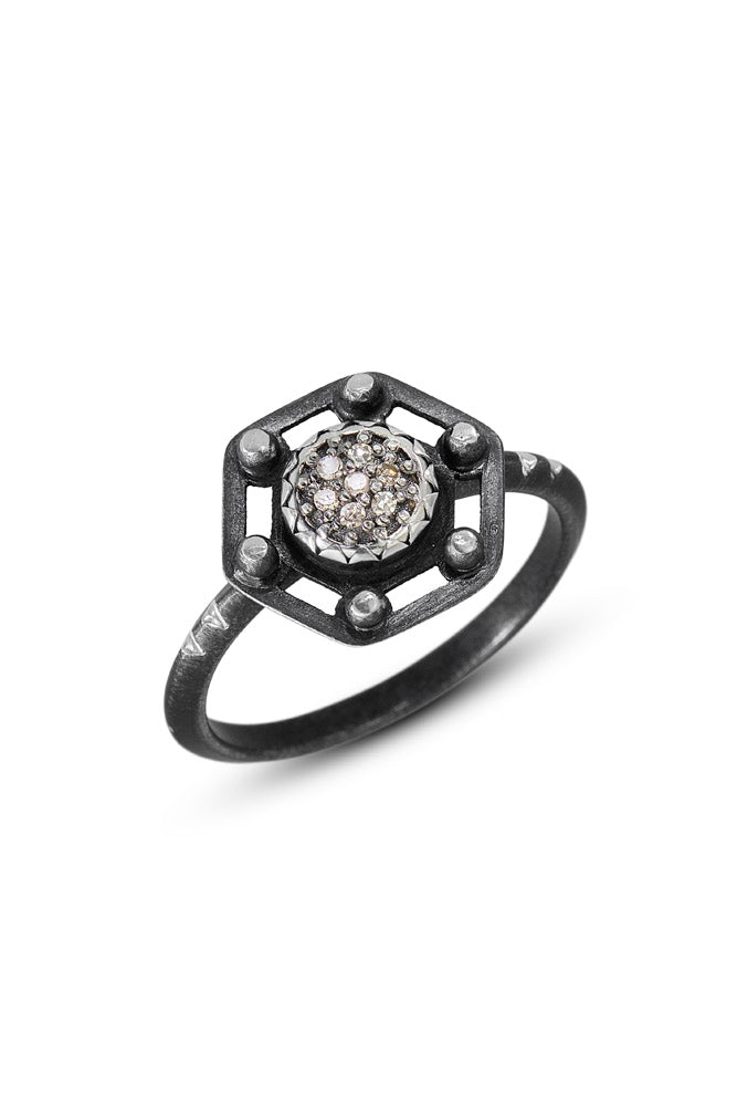 6mm pavé diamond is set into hexagon shape staring silver top of oxidized steering silver triangle band with notches for accents. Photo Credit: Cole Rodger Photography.
