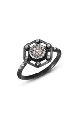 6mm pavé diamond is set into hexagon shape staring silver top of oxidized steering silver triangle band with notches for accents. Photo Credit: Cole Rodger Photography.