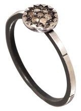 6mm pavé diamond charm is set into sterling silver a top of straight sterling silver band with notches. Photo Credit: Cole Rodger Photography.