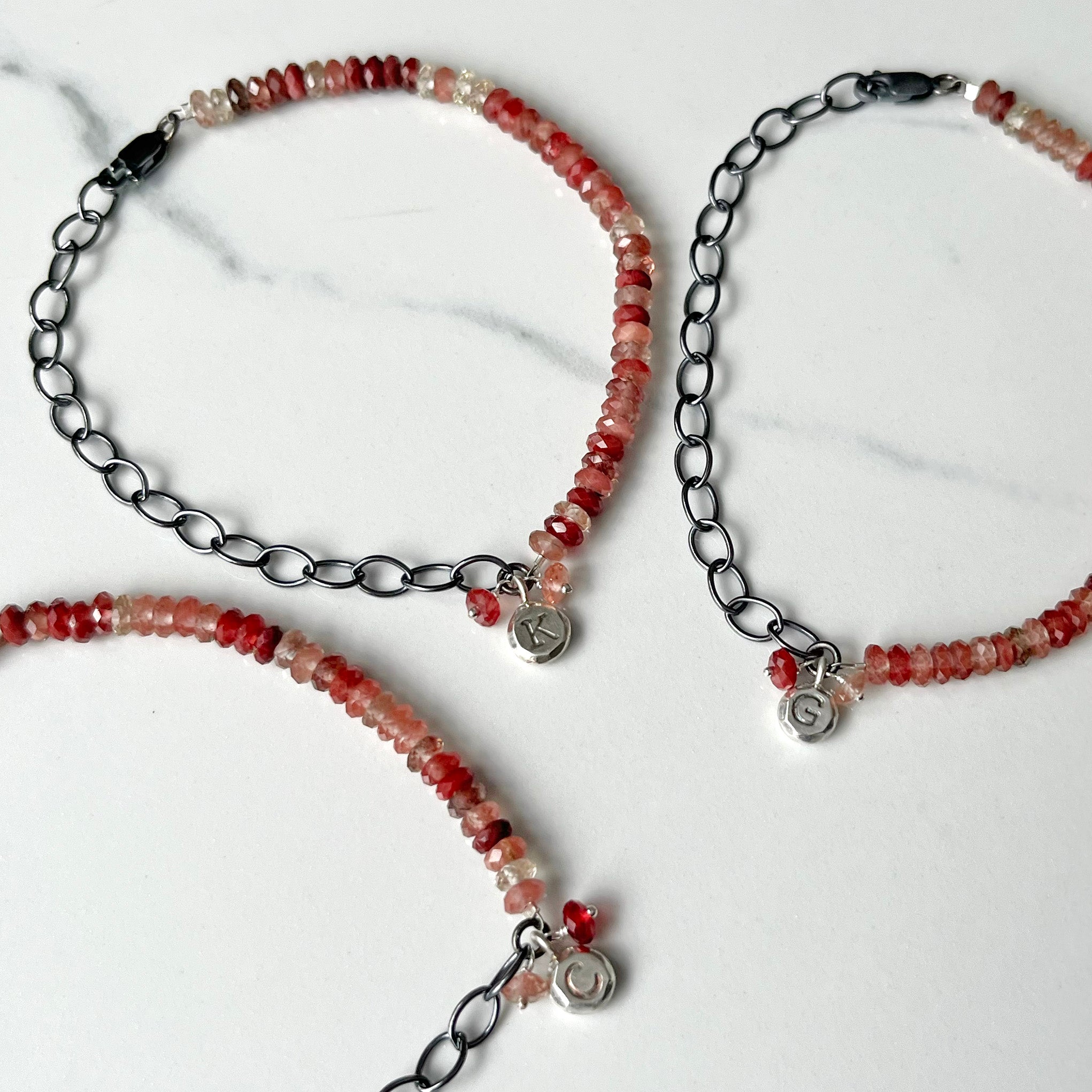 Aura Bracelet, Faceted Red Labradorite Gemstone with a customizable initial or a Zodiac Sign.