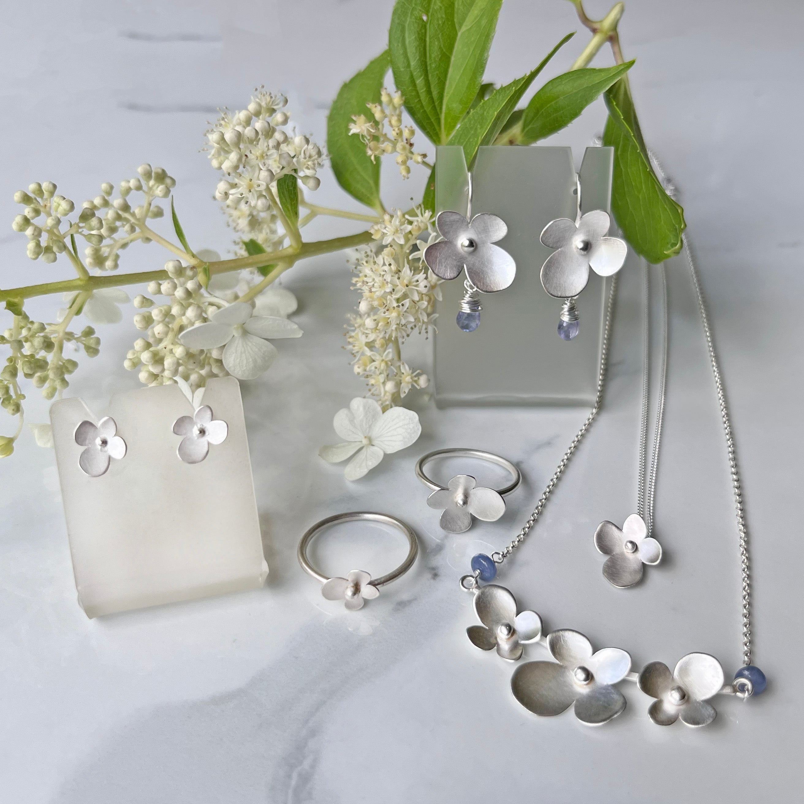 Hydrangea Necklace with Tanzanite, The Trio Of Hydrangea Petals in Satin Silver with Tanzanite Blue Purple Accent. Elegant and Super Lightweight.