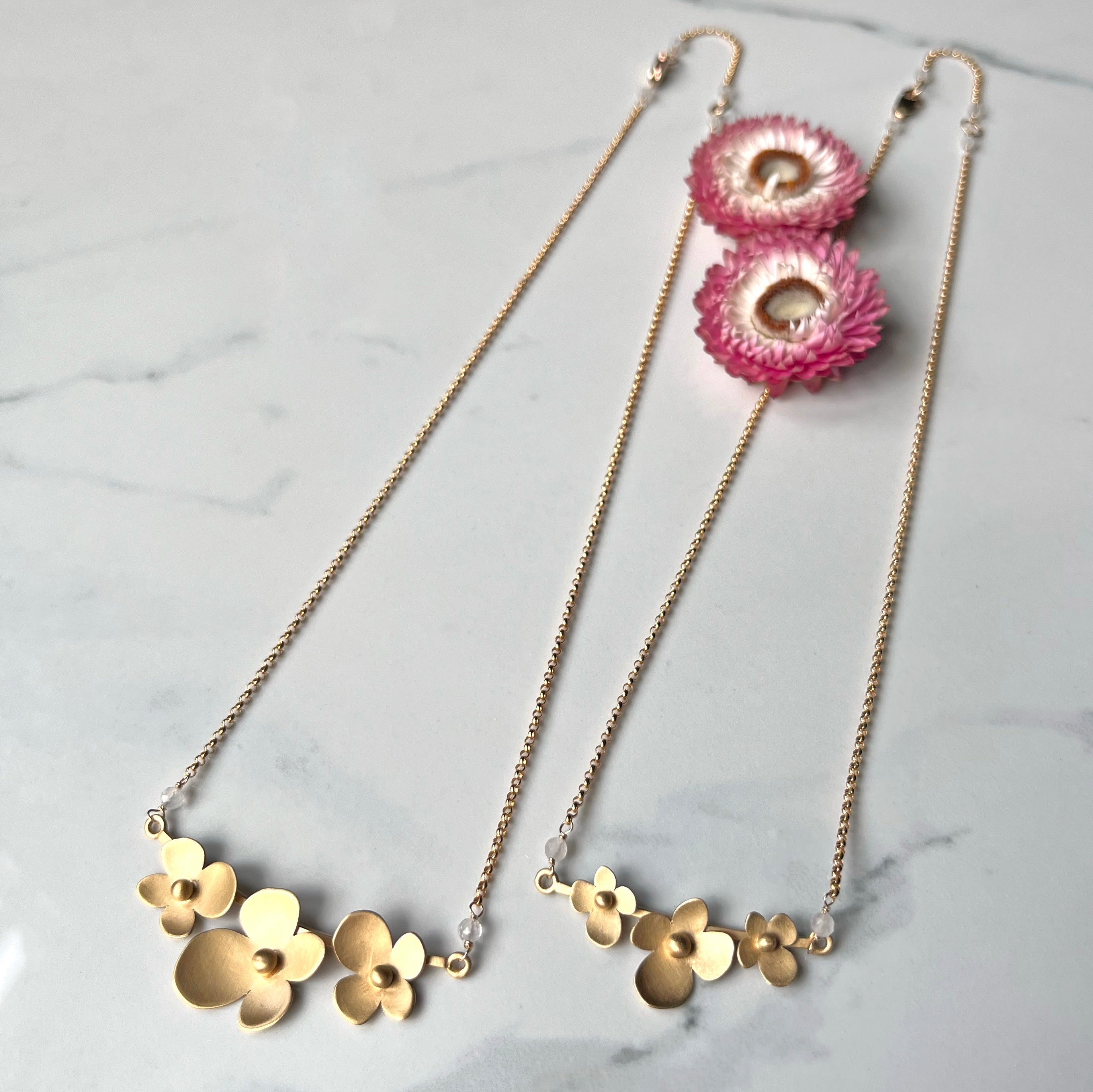 Sunlit Hydrangea Necklace with Moonstone, The Trio Of Hydrangea Petals in 14k gold vermeil with Moonstone Accent. Elegant and Lightweight.