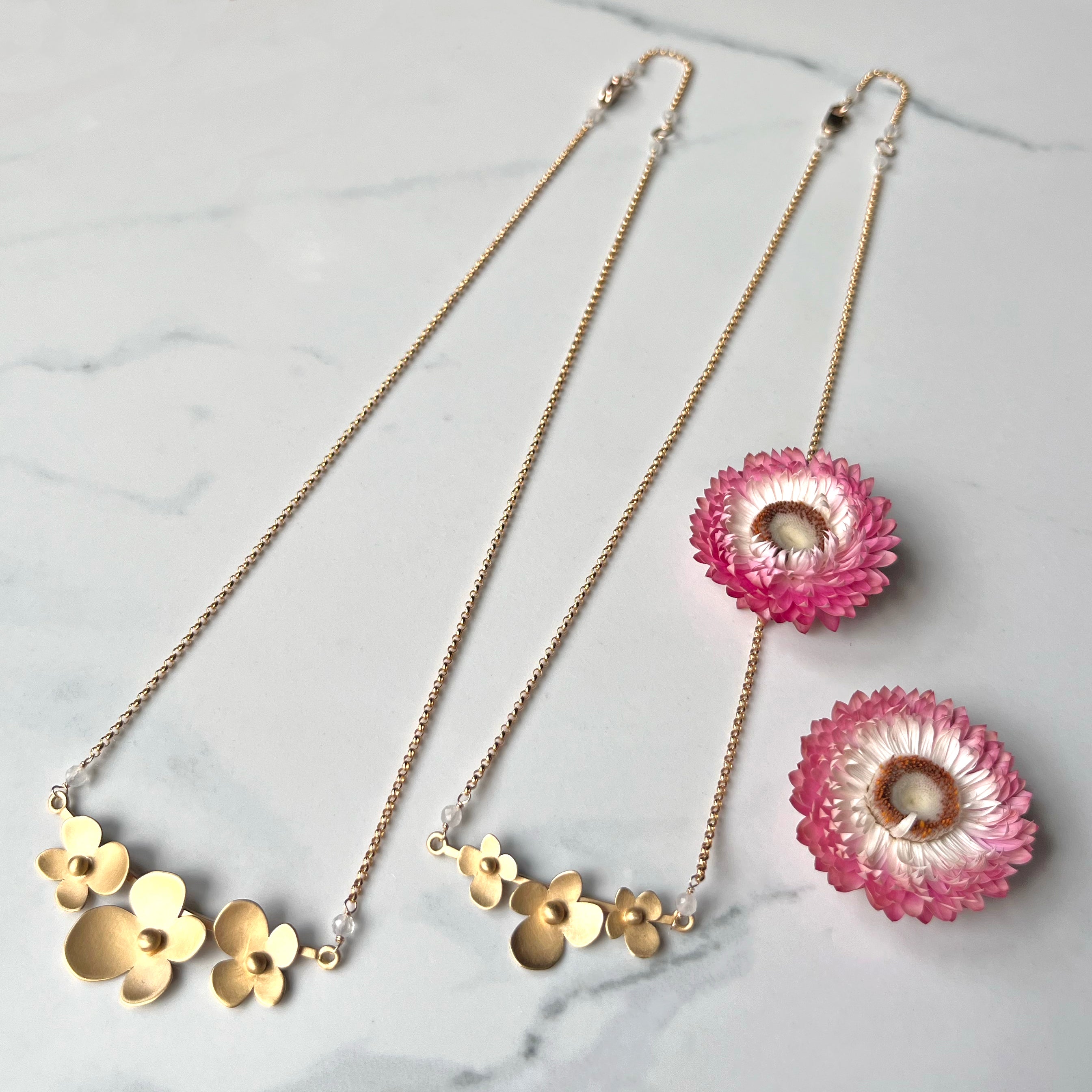 Sunlit Hydrangea Necklace with Moonstone, The Trio Of Hydrangea Petals in 14k gold vermeil with Moonstone Accent. Elegant and Lightweight.