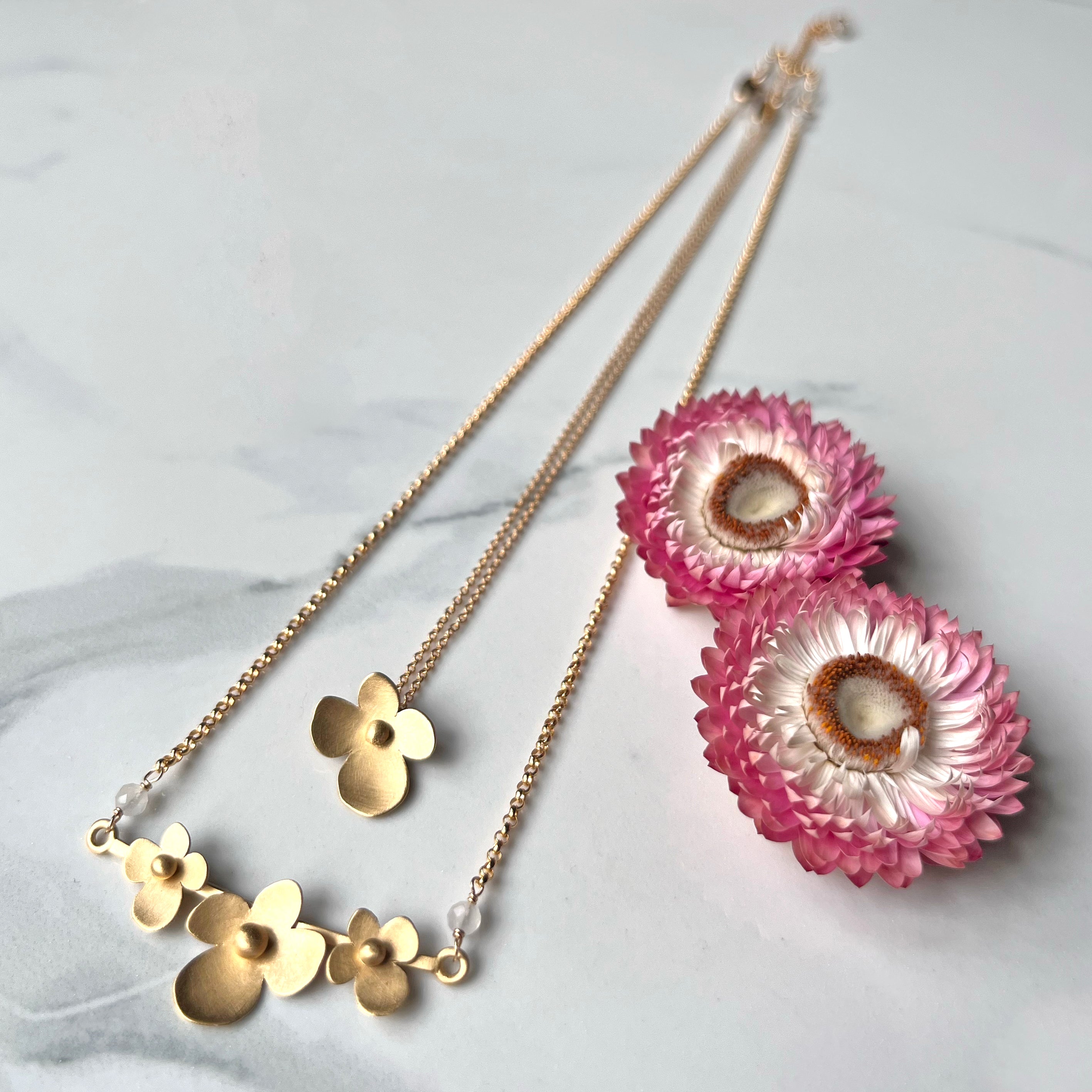 Sunlit Hydrangea Necklace with Moonstone, The Trio Of Hydrangea Petals in 14k gold vermeil with Moonstone Accent. Elegant and Lightweight.