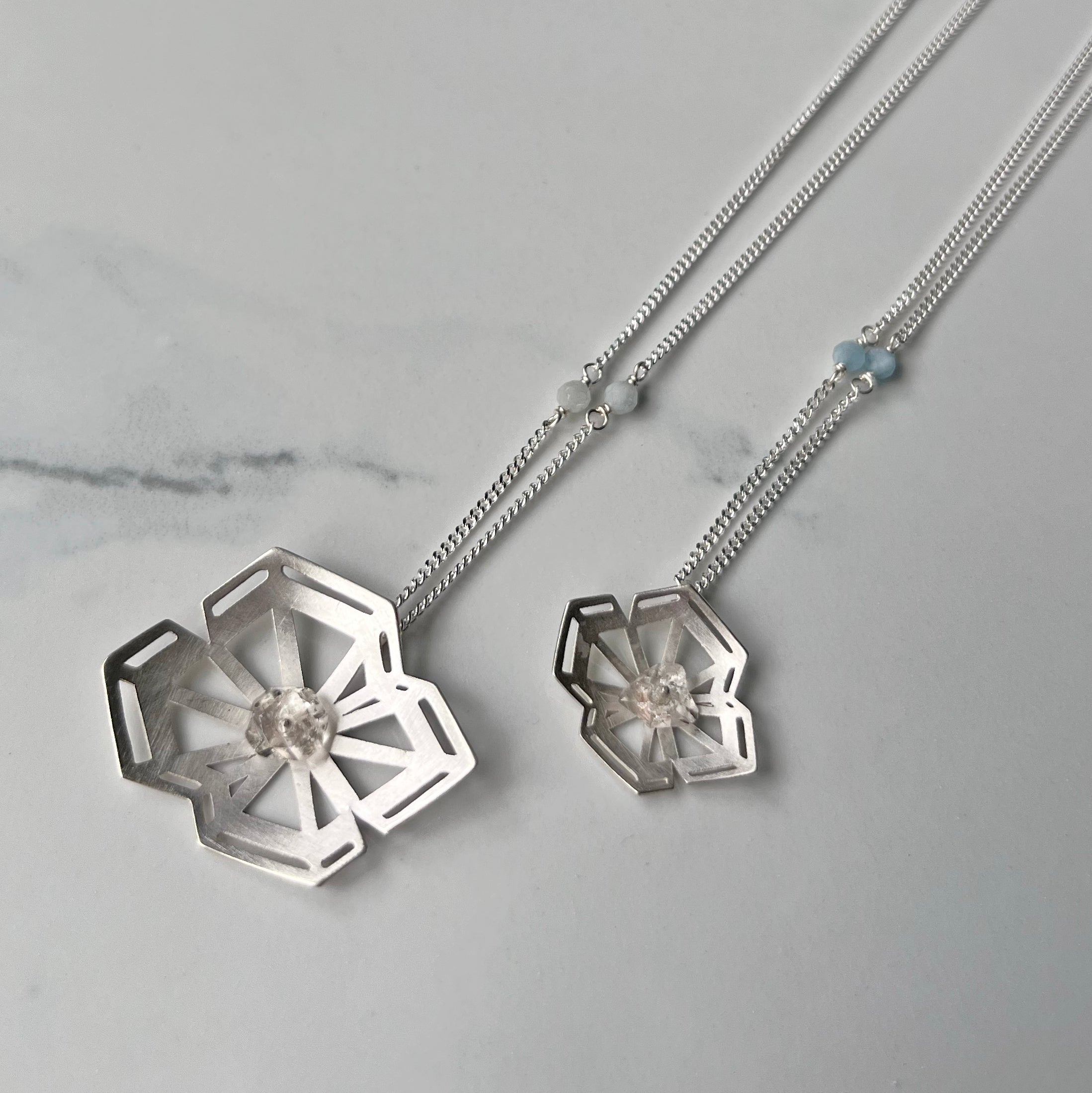Winter Geometry Necklace, Satin Finished Sterling Silver Accented with Two Pointed Herkimer Diamond.