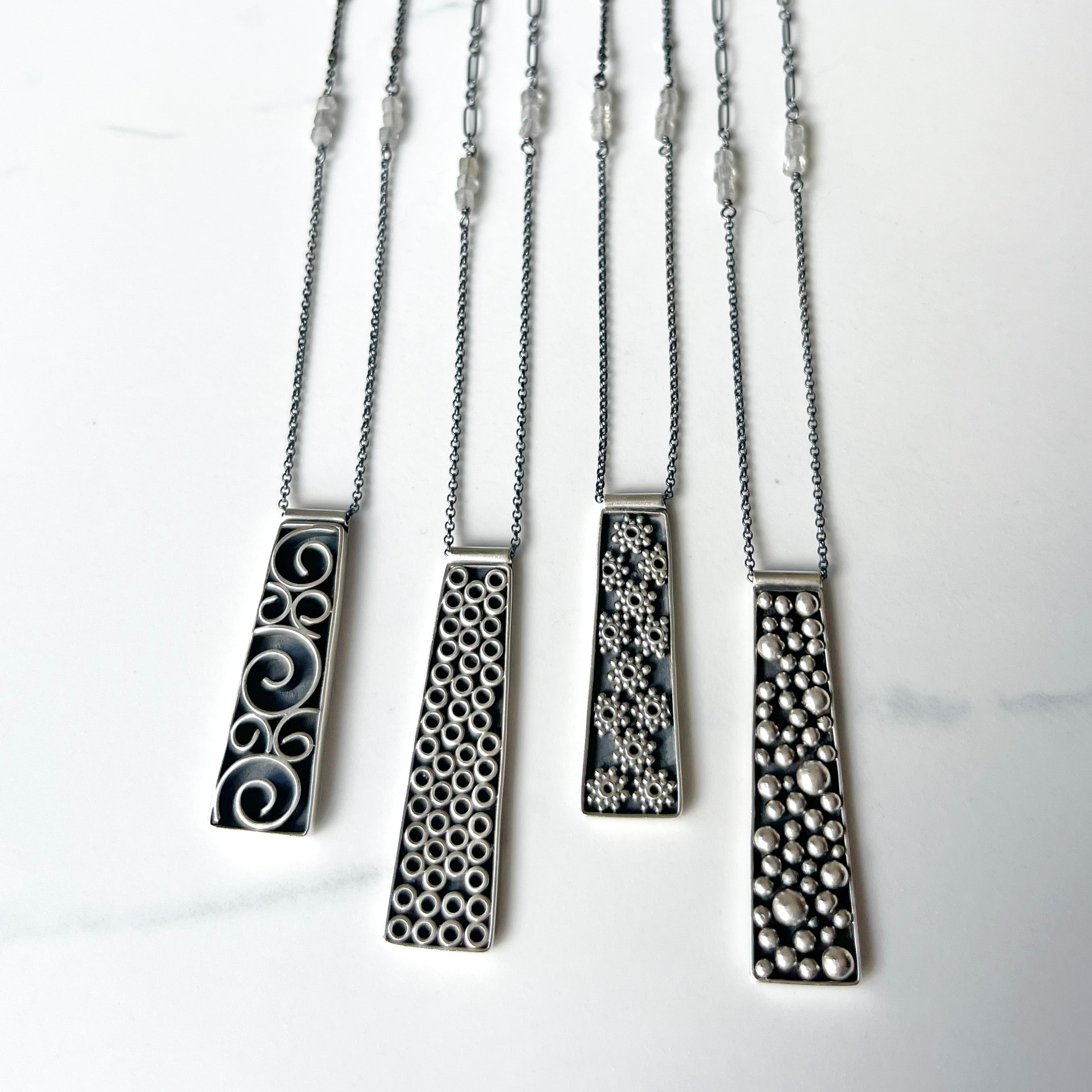 Galaxy Pendants, adjustable length and versatile with faceted labradorite beads.