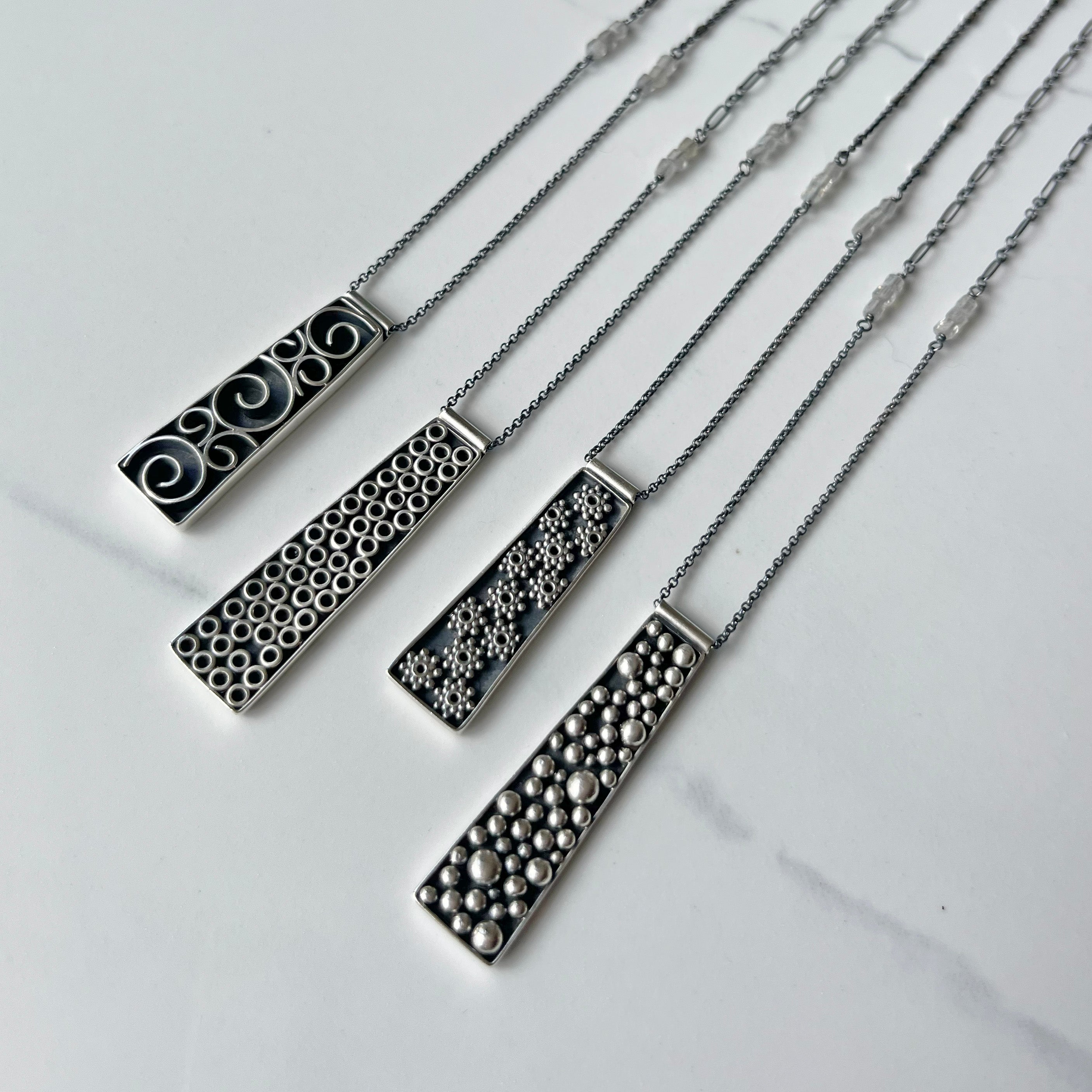 Galaxy Pendants, adjustable length and versatile with faceted labradorite beads.