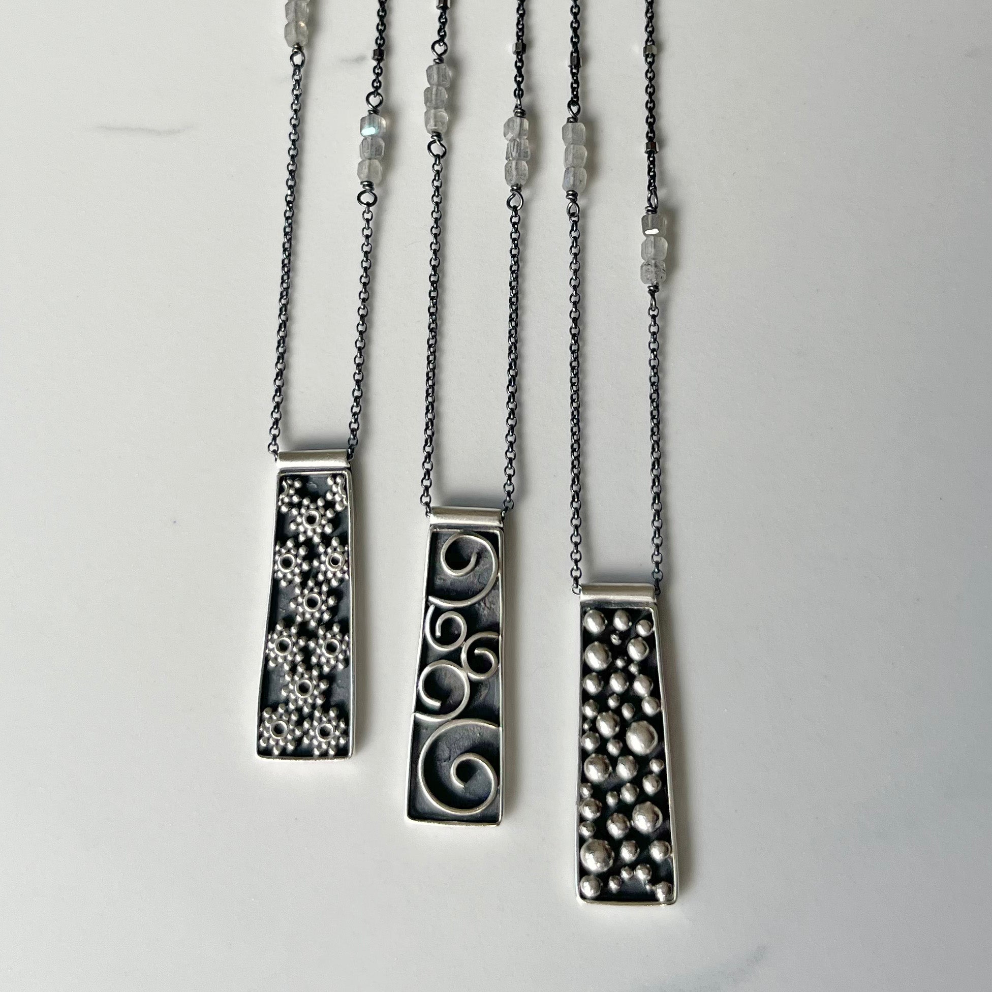 Galaxy Pendants, adjustable length and versatile with faceted labradorite beads.