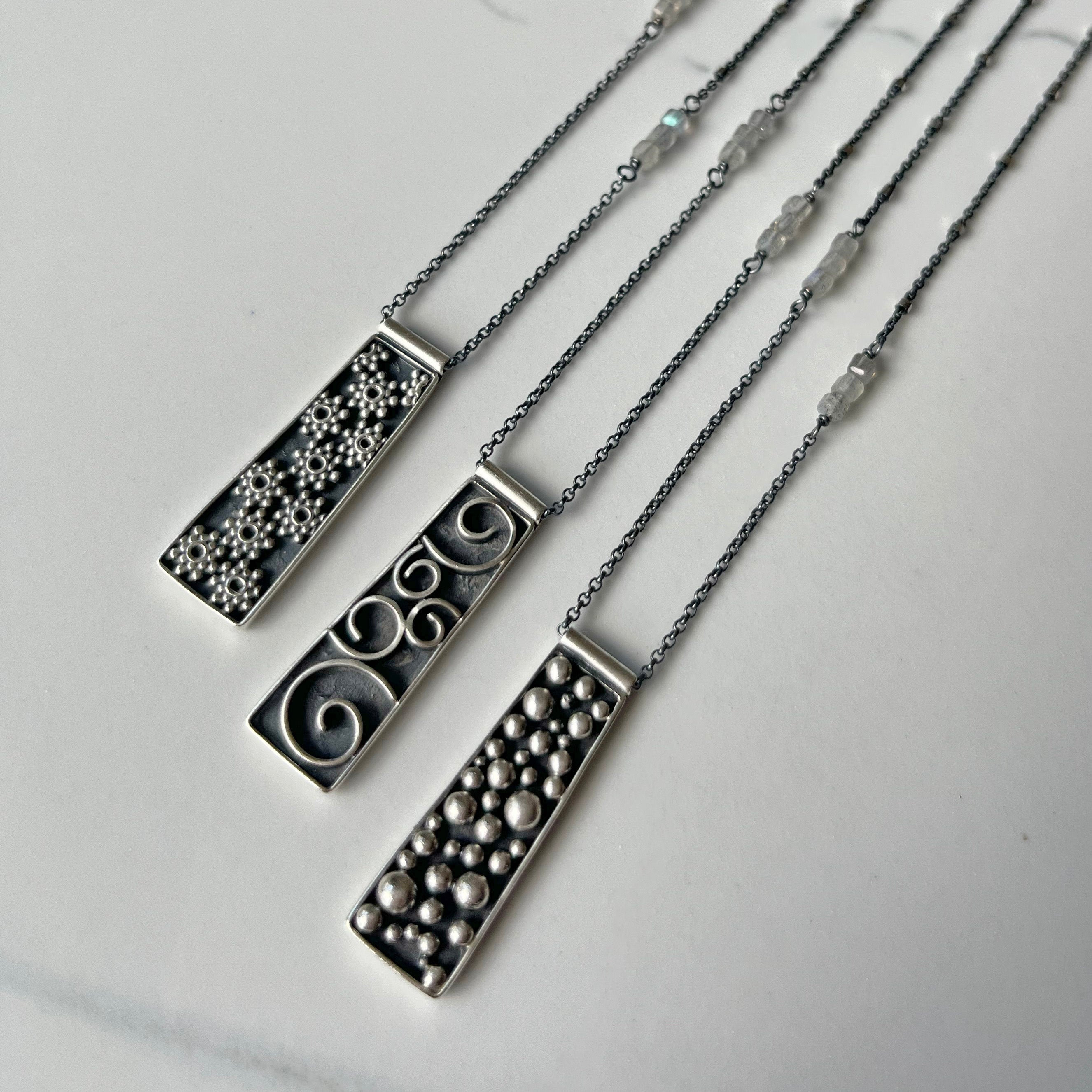 Galaxy Pendants, adjustable length and versatile with faceted labradorite beads.