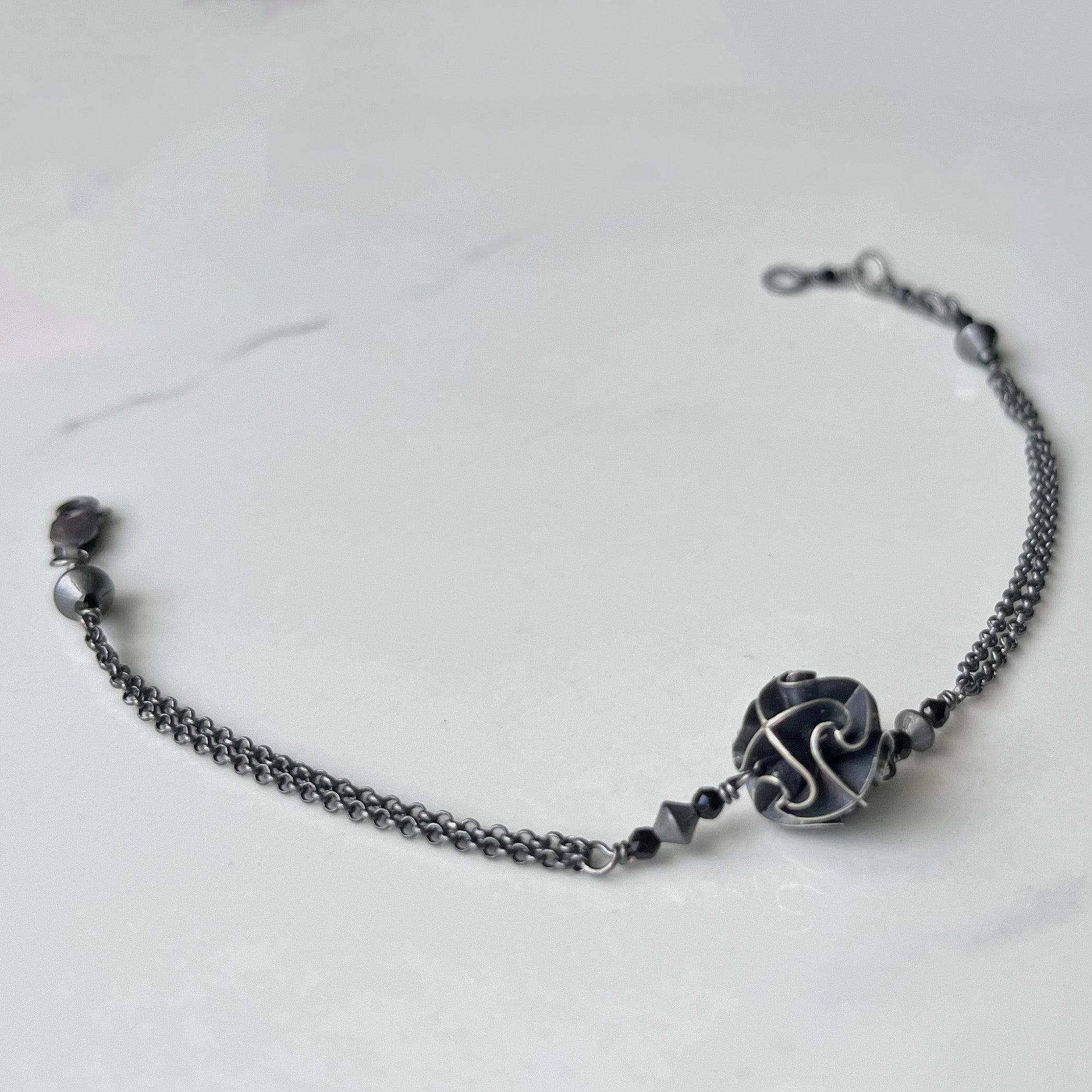 Mini Flora Bracelet, A Delicate and Floral Bracelet with Adjustable Length.